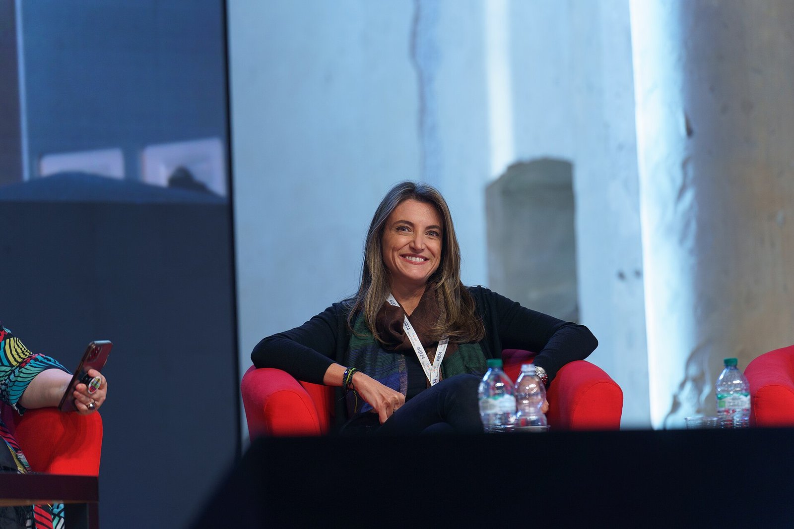 Patrícia Campos Mello seated on a stage at the International Journalism Festival in Perugia, 2024