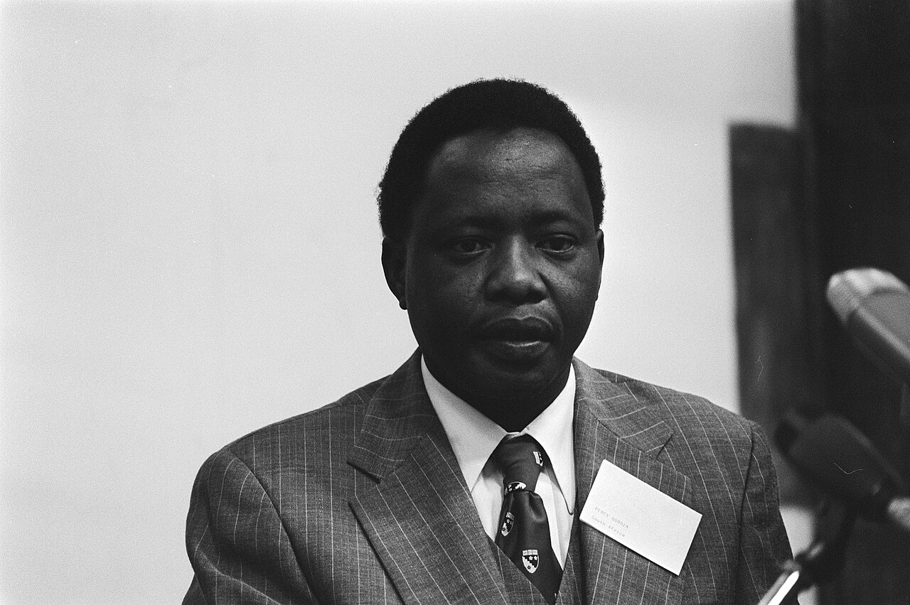 Percy Qoboza at a press congress in the Netherlands, 23 May 1978, wearing a name badge reading "Percy Qoboza, South Africa"