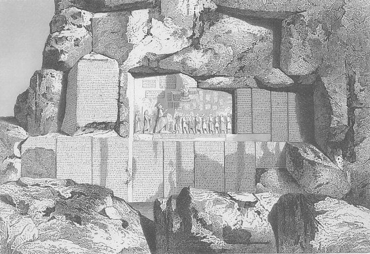 Steel engraving of the Bisotun cliff: the Behistun relief and panels of text set into the rock face