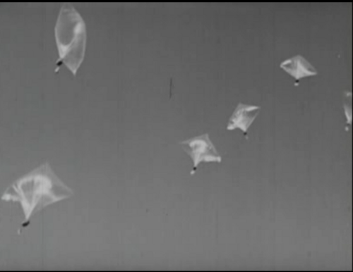 Still from a 1956 Crusade for Freedom advertisement showing Radio Free Europe balloons crossing the Iron Curtain