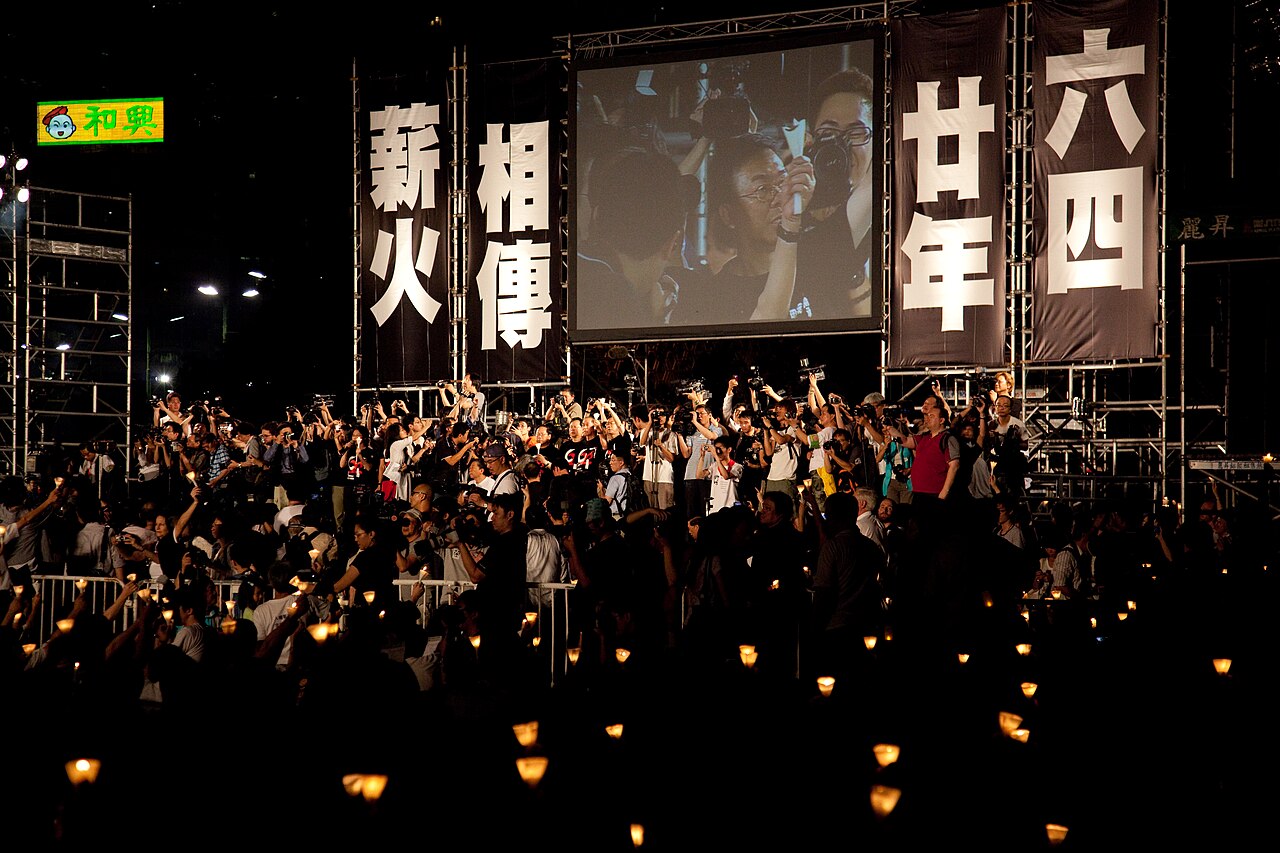 The candlelight vigil in Victoria Park, Hong Kong, on 4 June 2009, with banners reading 'June Fourth, twenty years'