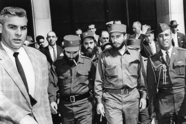 Fidel Castro in Washington, April 1959, with officers of the new government. A State Department security officer is at left.