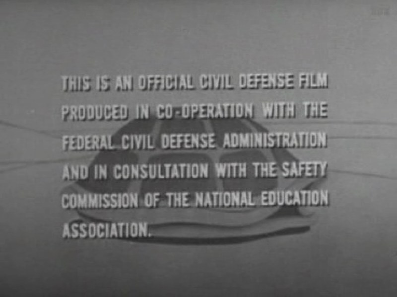 The film's own title card: This is an official civil defense film produced in co-operation with the Federal Civil Defense Administration and in consultation with the Safety Commission of the National Education Association