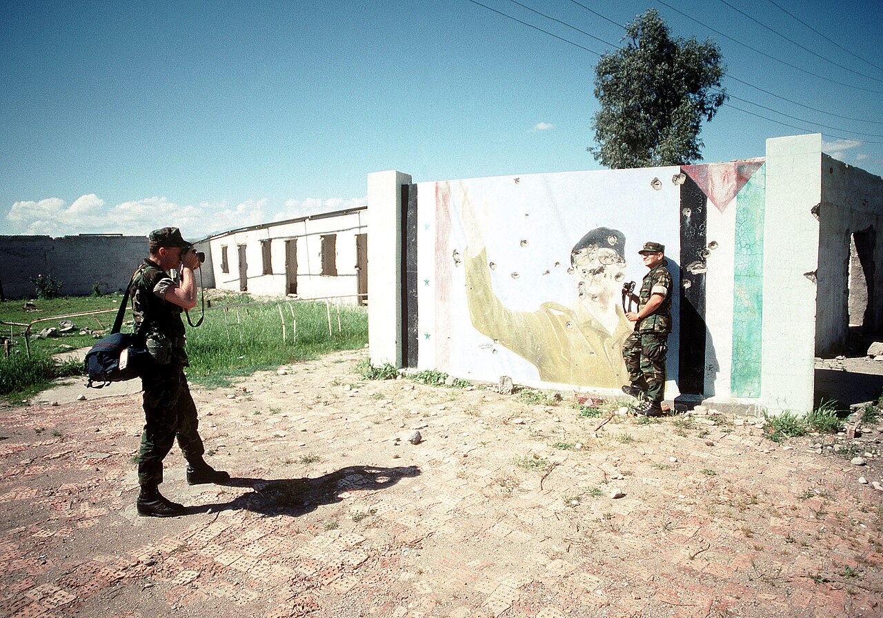 Defaced portrait of Saddam Hussein, Zakho, 1991