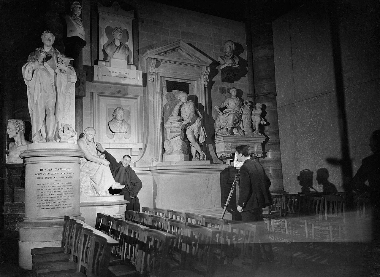Humphrey Jennings directing a Crown Film Unit shot in Westminster Abbey, 1941