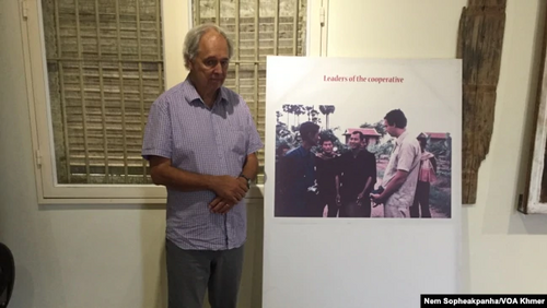 Gunnar Bergström beside a photograph from his 1978 visit to Democratic Kampuchea