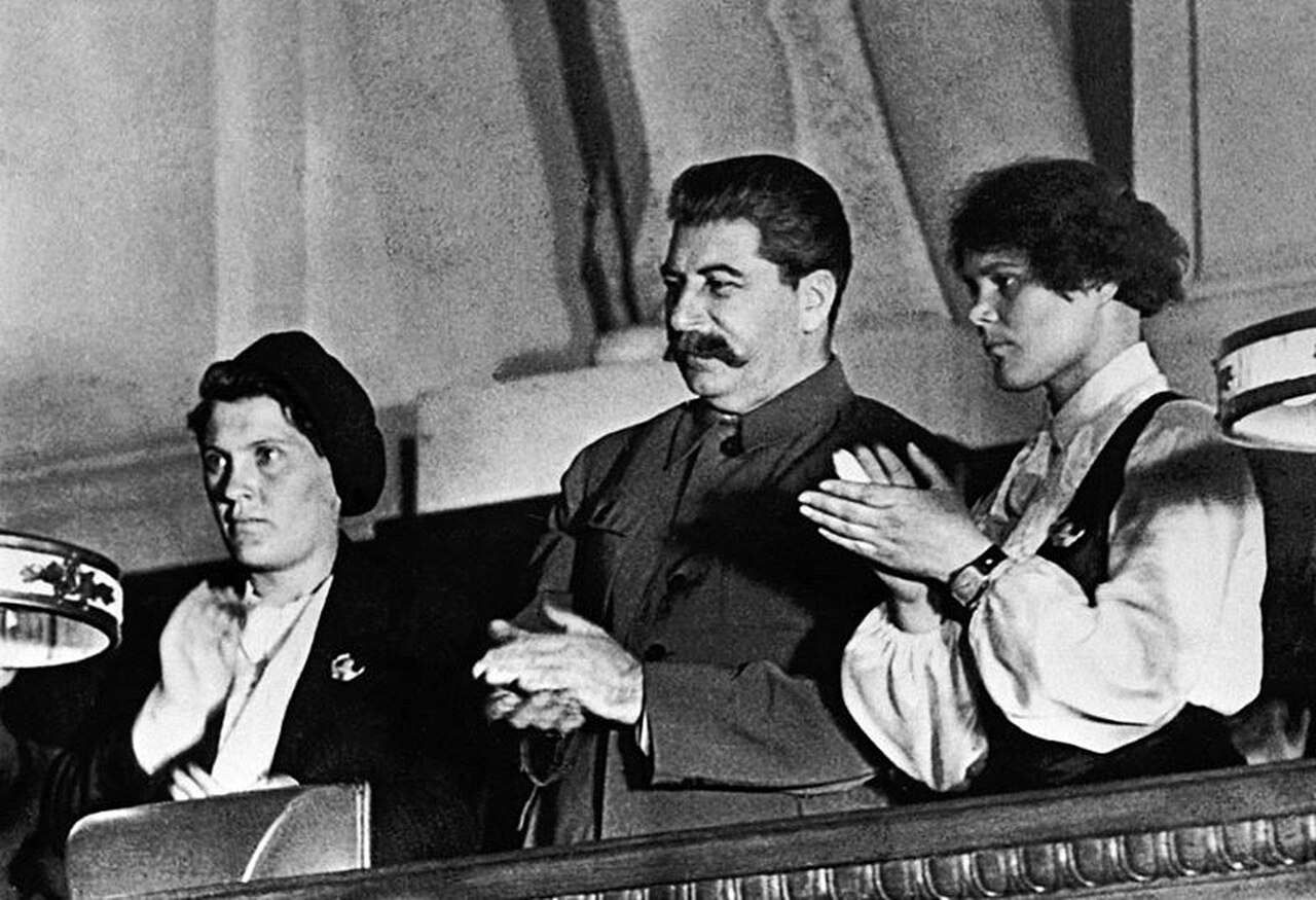 Joseph Stalin with the collective farmers Praskovya Angelina and Maria Demchenko at the 10th Komsomol Congress, 18 April 1936