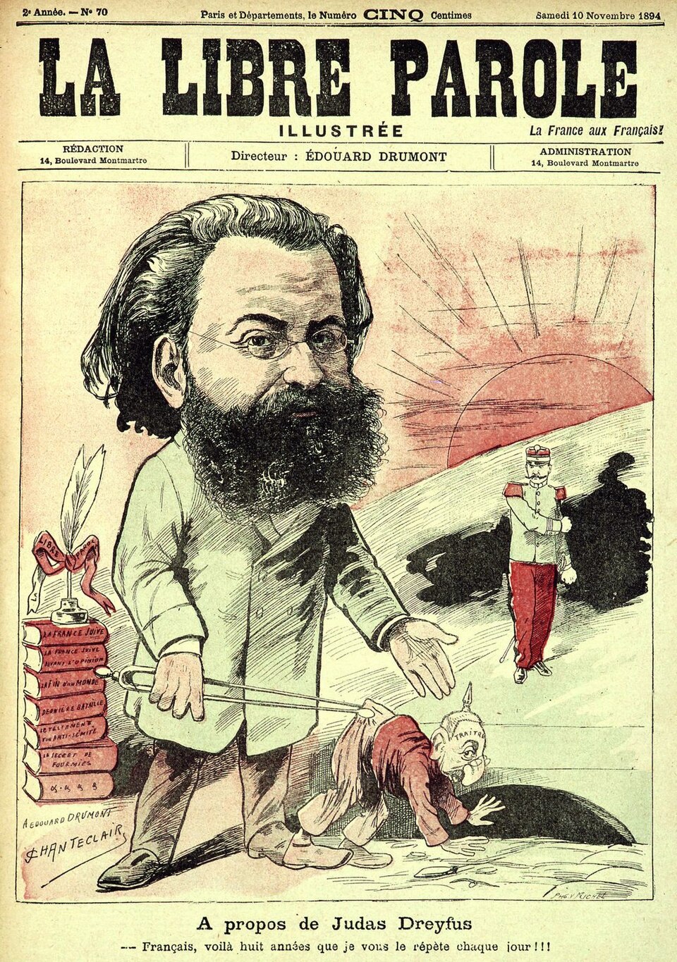 La Libre Parole illustrée cover: Édouard Drumont, huge, holds a small figure labelled Traitre by the seat of his trousers with a pair of tongs, beside a stack of his own books
