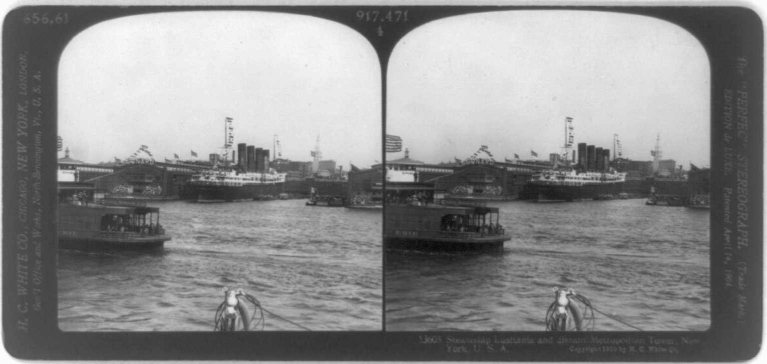 Stereograph of the Cunard liner Lusitania at her New York pier, flags flying, a ferry in the foreground