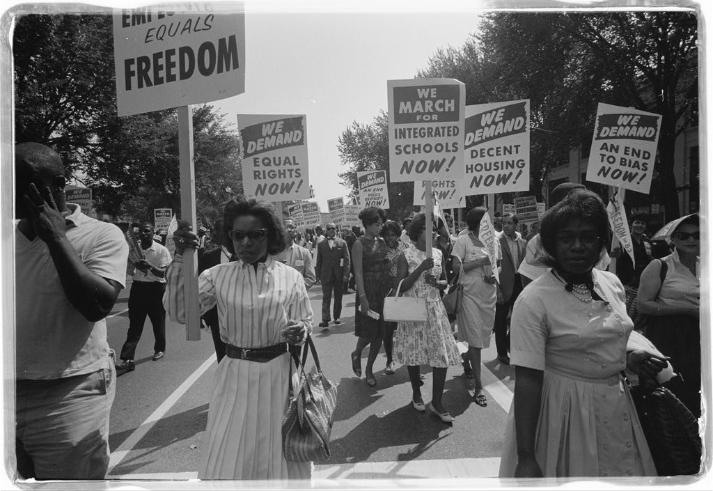 Marchers carrying placards reading "We demand equal rights now" and similar demands, March on Washington, 28 August 1963