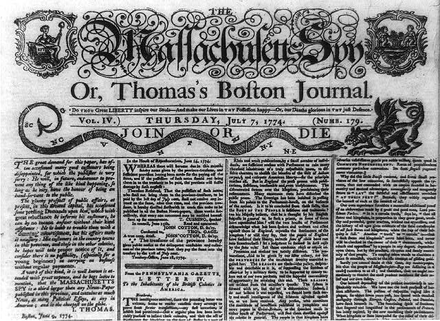 The Massachusetts Spy masthead: a segmented snake labelled with colony initials across the page facing a winged griffin, over the words JOIN OR DIE