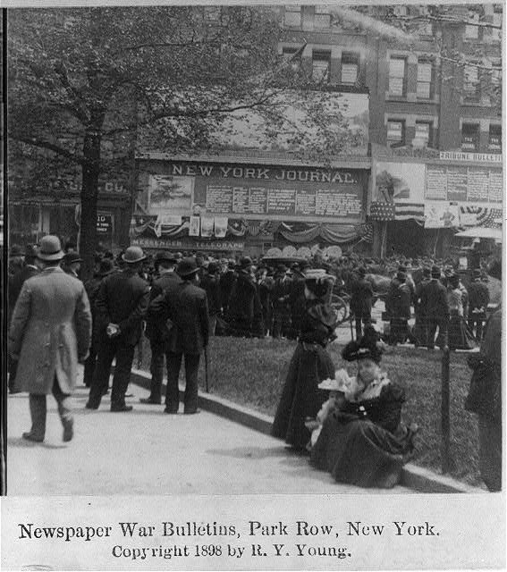 Crowd on Park Row, New York, reading war bulletins posted outside the New York Journal building