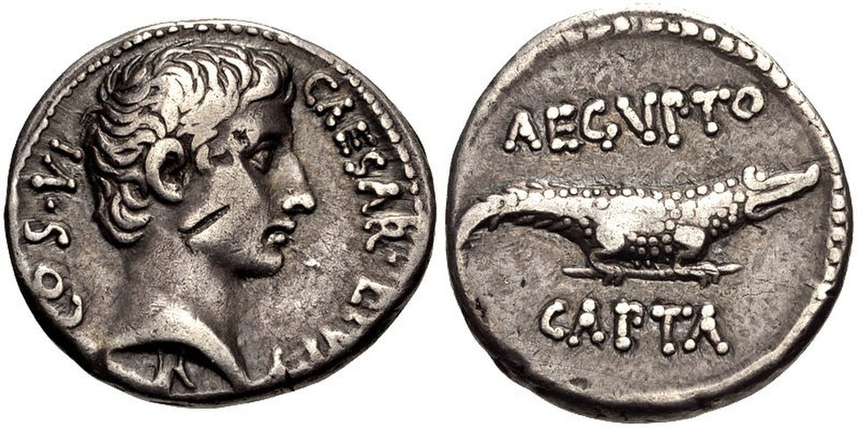 Silver denarius: on the left, bare head of Octavian with the legend CAESAR DIVI F COS VI; on the right, a crocodile with the legend AEGVPTO CAPTA
