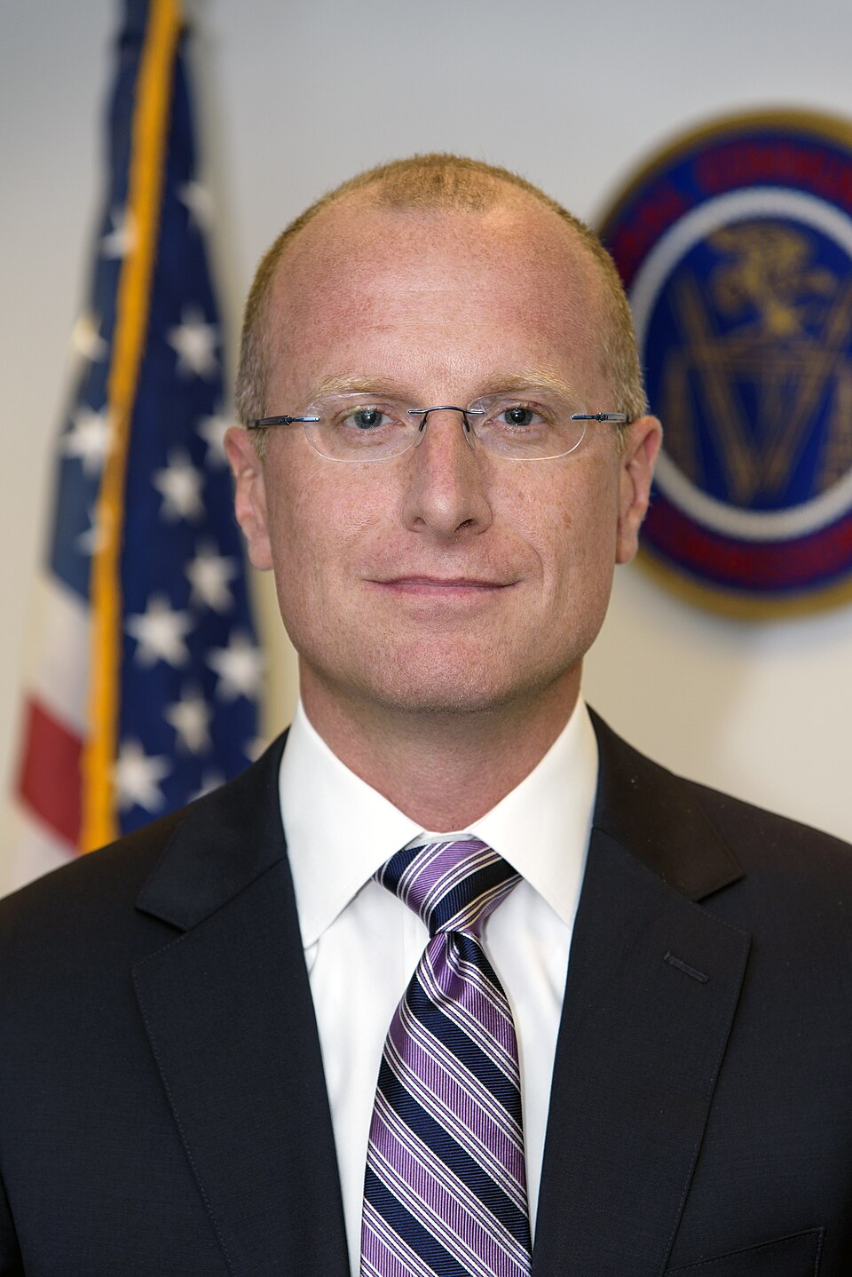 Official portrait of FCC Commissioner Brendan Carr