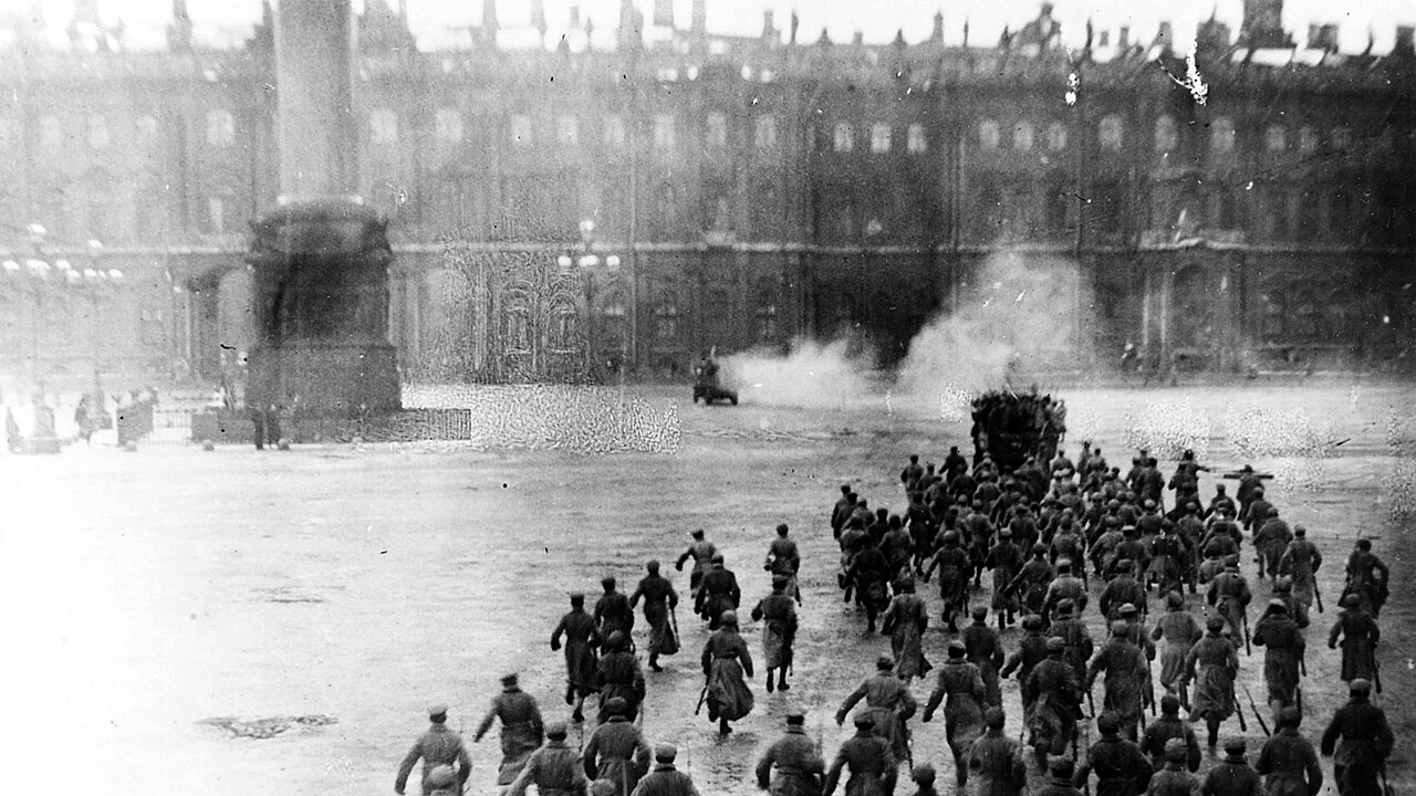 Retouched photograph of the 1920 mass re-enactment The Storming of the Winter Palace, Palace Square, Petrograd