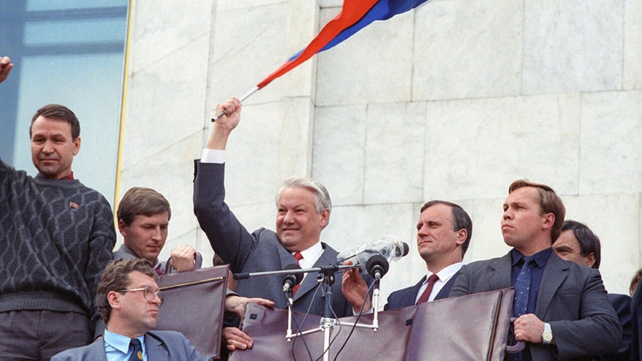 Boris Yeltsin waving the Russian tricolour at a rally, Moscow, 22 August 1991