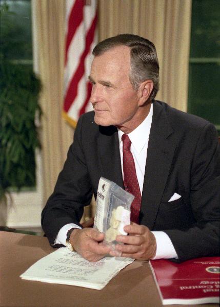 President Bush holds up a bag of crack in the Oval Office