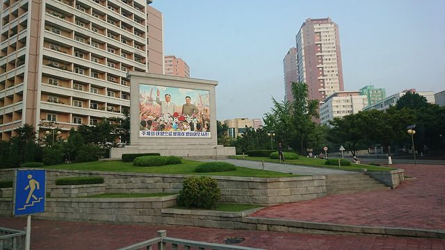 Mural of Kim Il-sung and Kim Jong-il: "Uphold them forever as the sun of Juche!", Bukseong and Chollima Street, Pyongyang (photographed 2019)