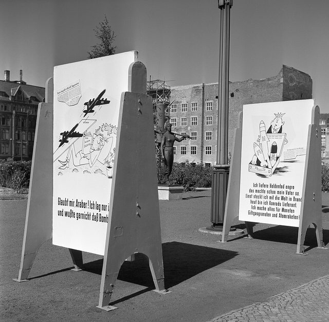 Adenauer and Krupp cartoon boards, open-air display, Rathausstrasse, East Berlin