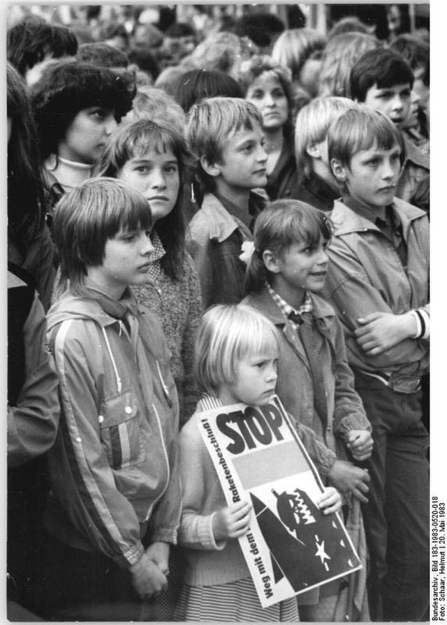"STOP Raketenbeschluß!": child with a placard at a youth peace rally, Suhl