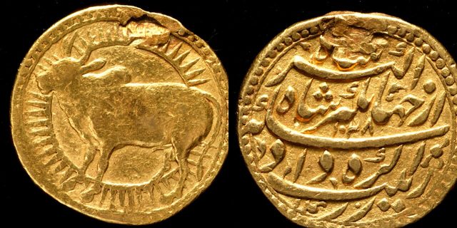 Mughal gold coin of Jahangir, dated 1028 AH, with a bull inside a ring of sun rays