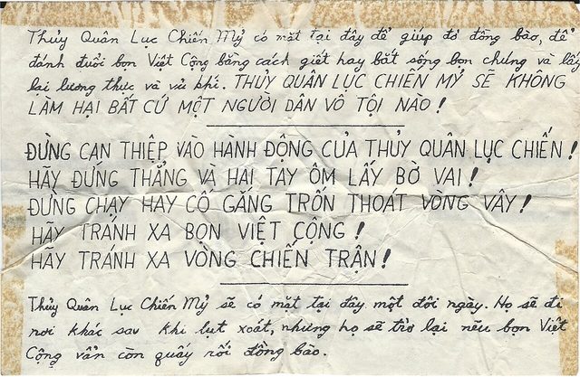 Thủy Quân Lục Chiến Mỹ có mặt tại đây để giúp đỡ đồng bào (U.S. Marines Are Here to Help the Villagers)