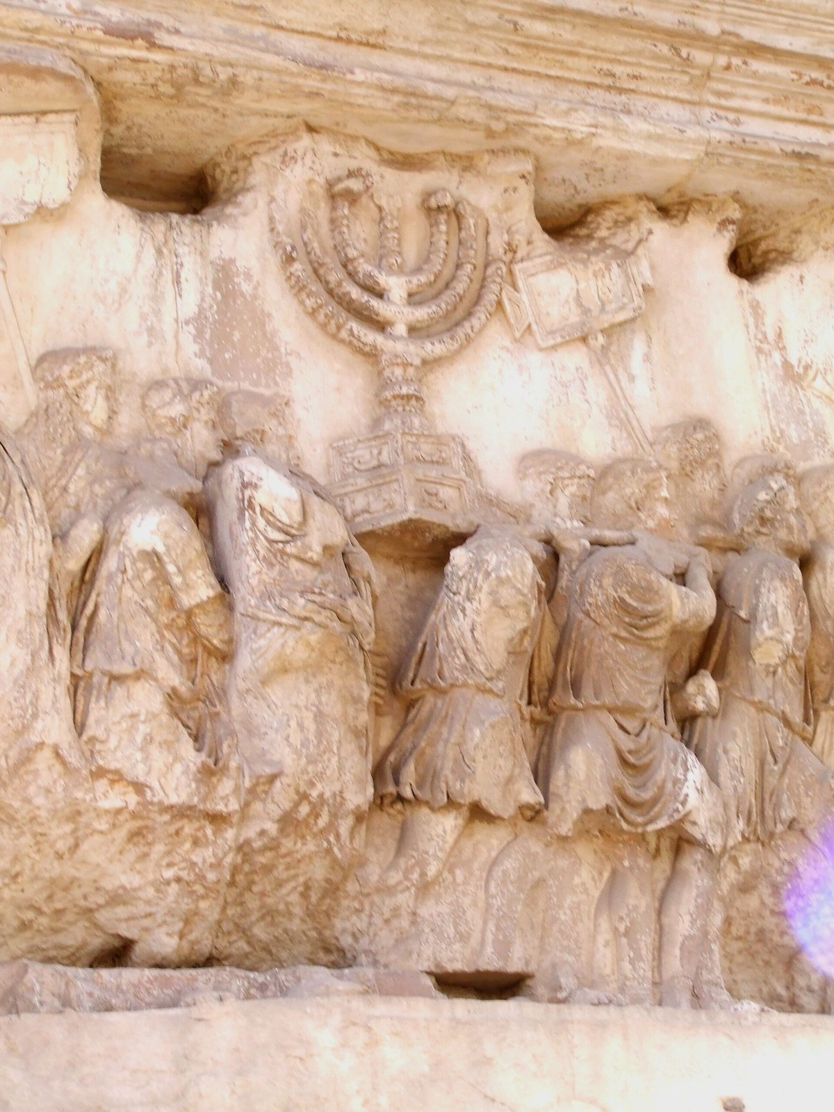 Relief on the Arch of Titus, Rome: soldiers carrying the menorah and other spoils from the Temple at Jerusalem in a triumphal procession