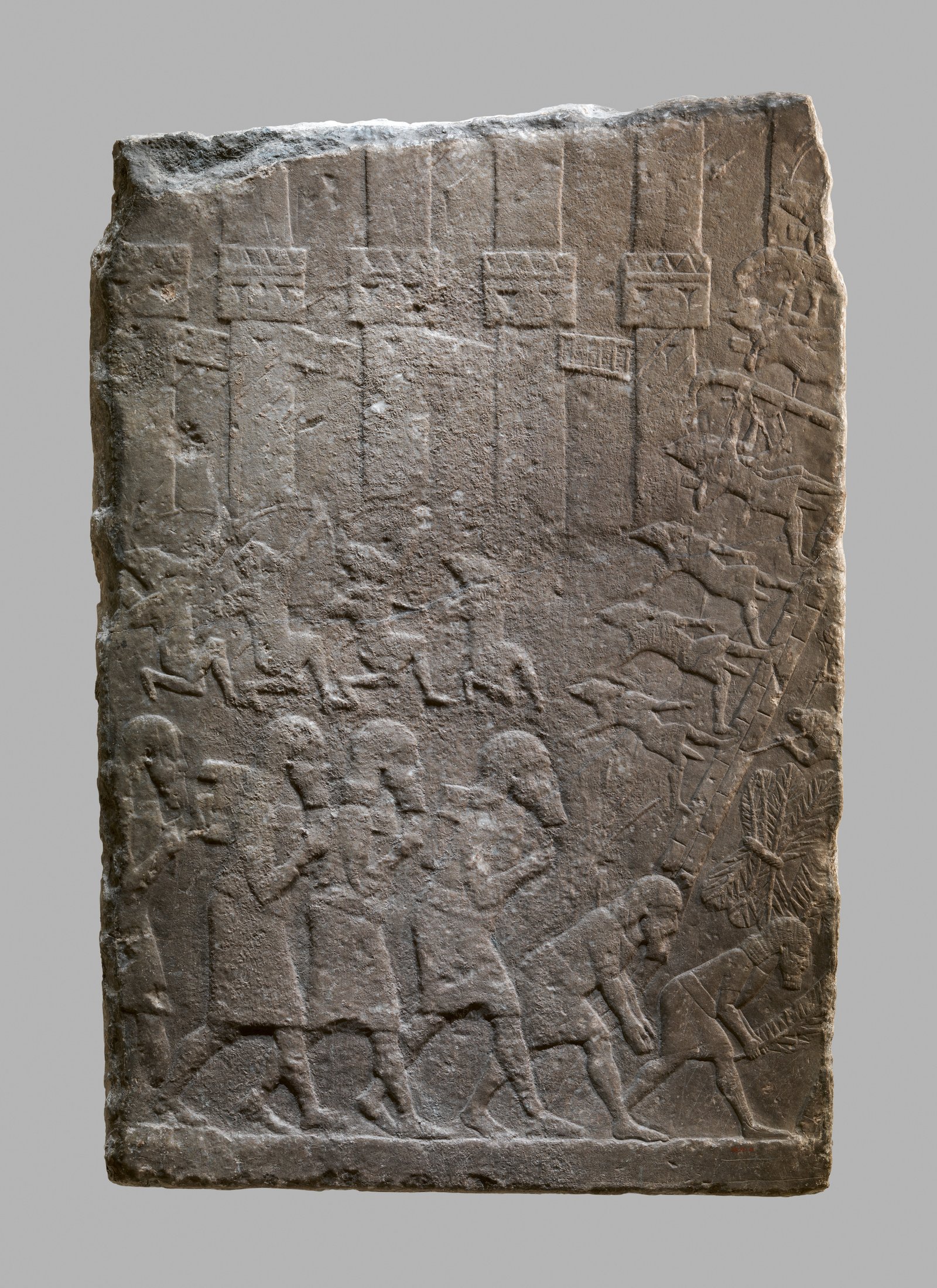 Alabaster relief, Assyrian troops storming a citadel, from Nineveh (reign of Sennacherib)