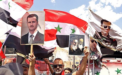 Pro-government rally with Assad portraits, Damascus, 15 April 2018