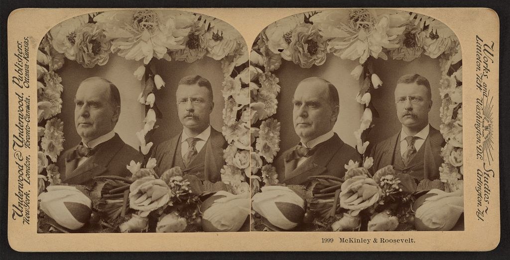 Stereograph card of studio portraits of McKinley and Roosevelt inside a floral arch