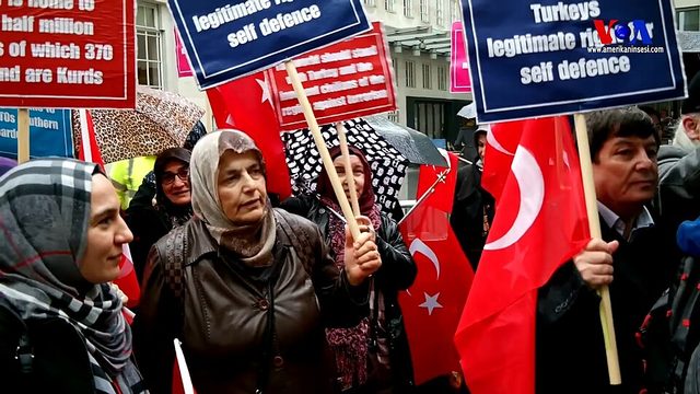 Placards backing Turkey's Afrin operation, European Turkish Democrats rally, Voice of America still (London, 24 January 2018)