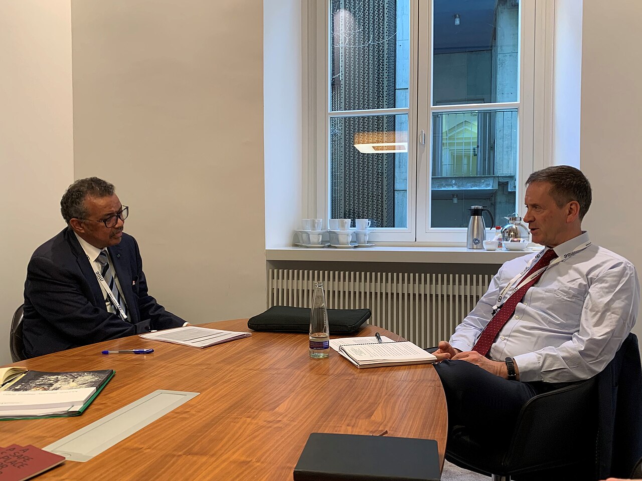 WHO Director-General Tedros Adhanom Ghebreyesus in a meeting at the Munich Security Conference with USAID's Mark Green, February 2020