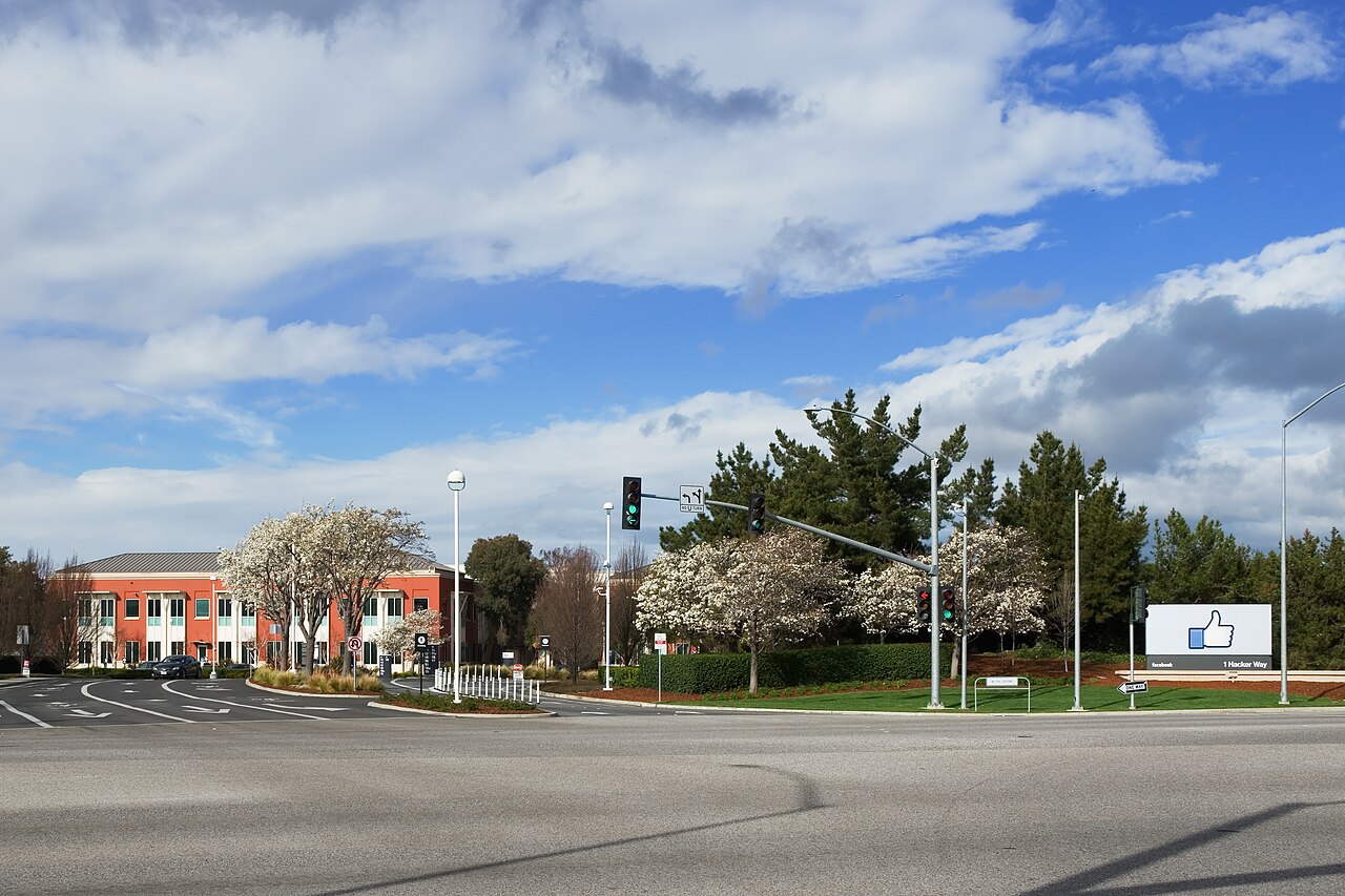 Entrance sign and driveway at Facebook's headquarters, 1 Hacker Way, Menlo Park, California