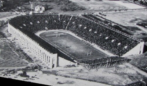 Aerial photograph of Princeton's Palmer Stadium filled with spectators
