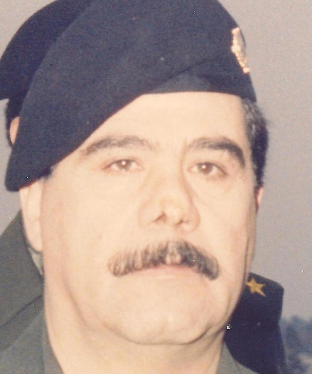 Adnan Khairallah in a beret and uniform in a portrait of 1989