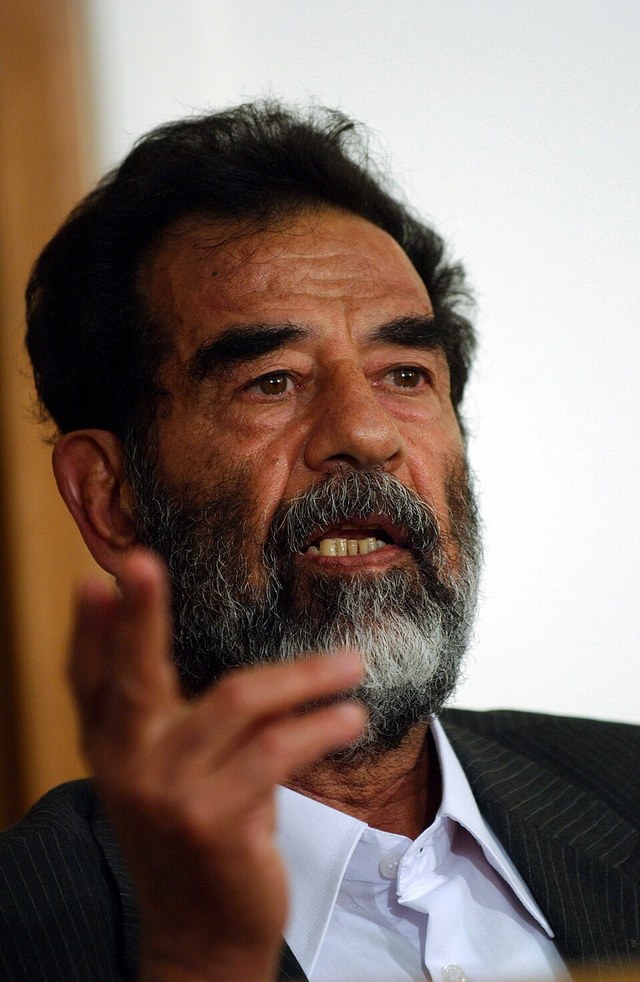 Saddam Hussein speaking at his arraignment before the Iraqi Special Tribunal on 1 July 2004