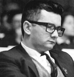 Armando Hart in a dark jacket and dark-rimmed glasses, seated, at the Sixth Congress of the SED in Berlin, 15 January 1963