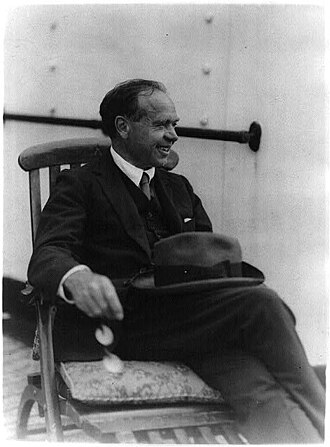 Lord Beaverbrook seated on a ship's deck, undated