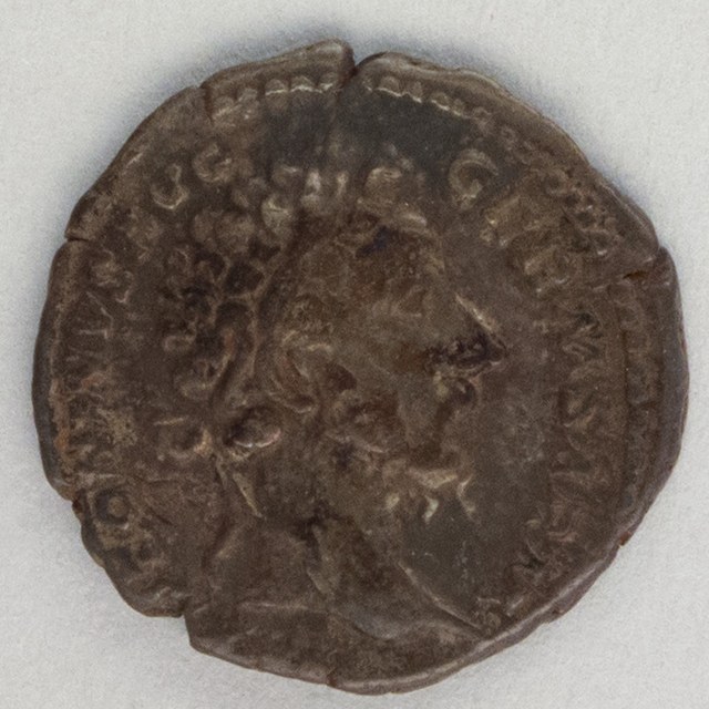 Worn silver denarius of Marcus Aurelius, bust right, legend partly legible