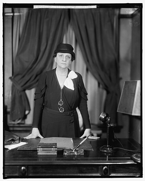 Frances Perkins at her desk, undated portrait
