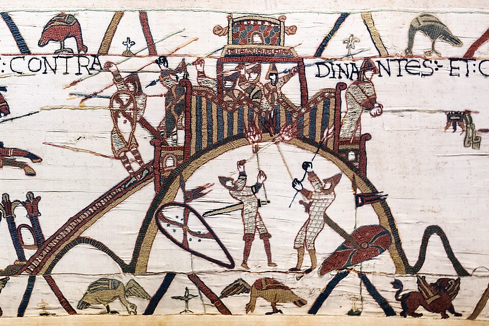 Bayeux Tapestry scene: soldiers attack the timber tower on the motte of Dinan castle