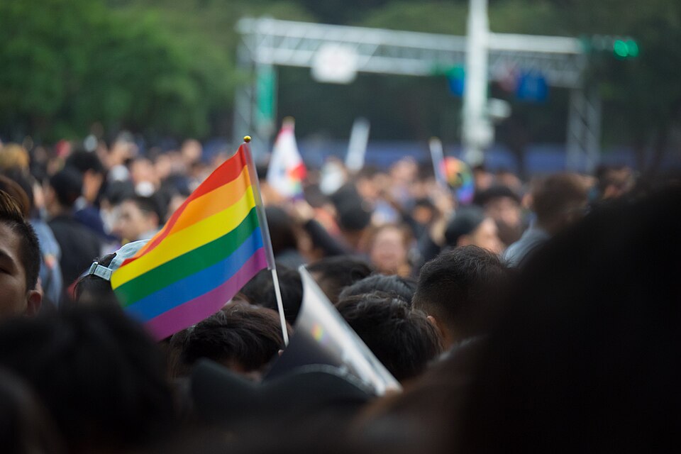Rainbow flag in a crowd at a marriage equality demonstration in Taipei, December 2016